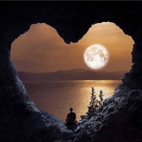 cave in the form of heart with a view to the moon