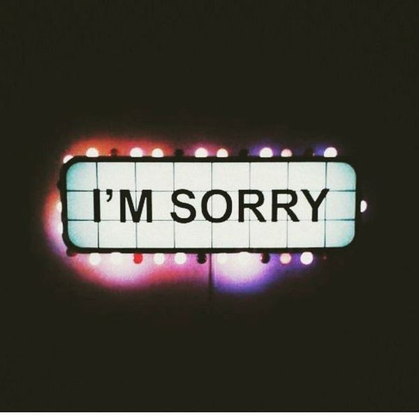 i am sorry neon text on poster